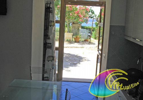 Soggiorno con vista mare appartamento piano terra